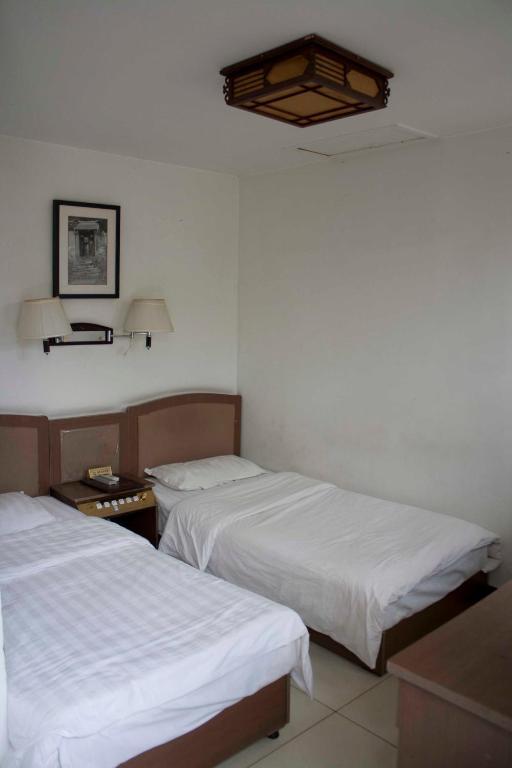 Three Legged Frog Hostel بكين الغرفة الصورة