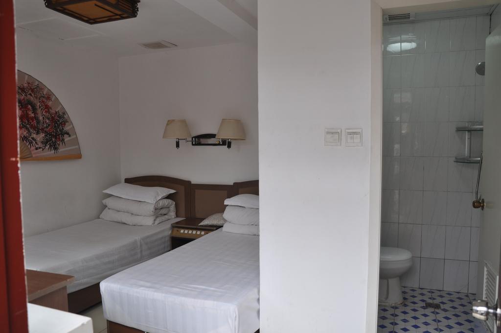 Three Legged Frog Hostel بكين الغرفة الصورة